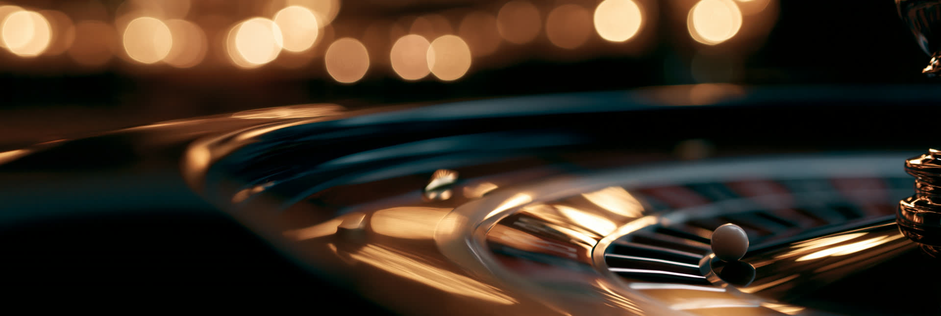 A live dealer studio with a card table lit in warm evening tones
